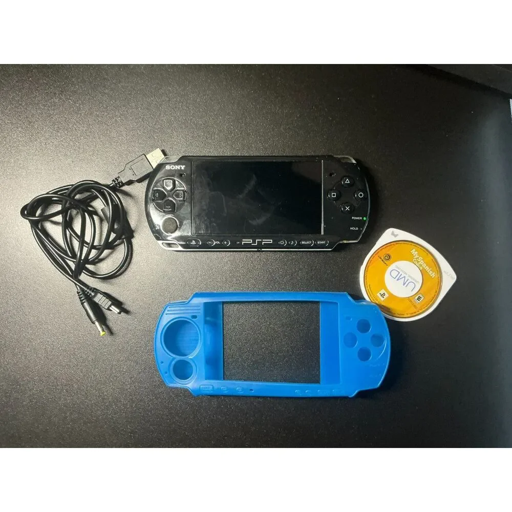 Sony PSP-3001 Bundle w/ New Battery, Sony 1GB Memory Stick, Charger & Game